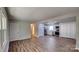 Open concept dining area adjacent to kitchen with wood-look floors at 1020 Fontana Ave, Charlotte, NC 28206