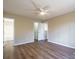 Large bedroom with hardwood floors and access to bathroom at 10429 Gold Pan Rd, Charlotte, NC 28215