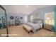 Large main bedroom with vaulted ceiling, sitting area, and natural light at 126 Rustling Waters Dr, Mooresville, NC 28117