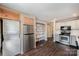 Kitchen with stainless steel appliances, white and gray cabinets, and wood-look flooring at 128 Mitchum Rd, Rock Hill, SC 29730