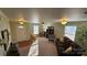 Well-lit living room with a front entryway, plush carpeting, and cozy furnishings at 156 Boiling Brook Dr, Statesville, NC 28625