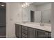 Modern bathroom with double vanity, gray cabinets, and white countertop at 257 Donsdale Dr, Statesville, NC 28625