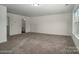 Spacious bedroom with plush carpet and ensuite bathroom at 257 Donsdale Dr, Statesville, NC 28625