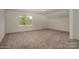 Spacious bedroom with neutral carpet and a window at 257 Donsdale Dr, Statesville, NC 28625