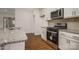 Modern kitchen featuring stainless steel appliances, granite countertops, and ample cabinet space at 257 Donsdale Dr, Statesville, NC 28625