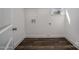 Laundry room with wood-look flooring and laundry hookups at 257 Donsdale Dr, Statesville, NC 28625