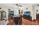 Dining area with a table, chairs, two fish tanks, and hardwood floors at 45 Sunderland Rd, Concord, NC 28027