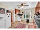 Kitchen with white appliances, wood cabinets, and tile floor at 45 Sunderland Rd, Concord, NC 28027