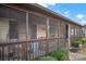 Screened porch with seating, ceiling fan, and front door access at 45 Sunderland Rd, Concord, NC 28027