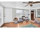 Bright sunroom with multiple large windows and wood flooring at 45 Sunderland Rd, Concord, NC 28027