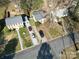 An aerial view showcasing the home's location and proximity to neighboring houses at 5701 Ilford St, Charlotte, NC 28215