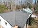 Aerial view of the home's roof, displaying the roof's condition and neighboring houses at 5701 Ilford St, Charlotte, NC 28215