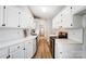 Kitchen with white cabinets and subway tile backsplash at 602 Helms Dr, Lowell, NC 28098