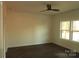 Bedroom with two windows and a ceiling fan at 615 E Ridge Rd, Salisbury, NC 28144