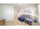 Bonus room featuring a sectional sofa, side tables, and access to stairs at 110 Windstone Common Ln, Mooresville, NC 28117