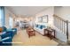 Open-concept living area with a view of the kitchen and dining area, featuring stylish furniture and decor at 110 Windstone Common Ln, Mooresville, NC 28117