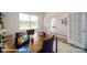 Well-lit office with double desks, natural light, and French doors at 110 Windstone Common Ln, Mooresville, NC 28117