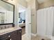 Bathroom with granite countertop and shower/tub combo at 116 Lockerbie Ln, Mooresville, NC 28115