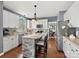 Well-equipped kitchen with island and white cabinets at 116 Lockerbie Ln, Mooresville, NC 28115