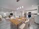 Open concept dining and living area next to a bright white kitchen at 221 Palmer St, Albemarle, NC 28001