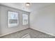 Bright bedroom with two large windows and carpet flooring at 2723 Texana Ct, Charlotte, NC 28269