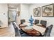 Dining room with wooden table, stylish chairs, and decorative accents at 2735 Texana Ct, Charlotte, NC 28269