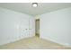 Bright bedroom with two closets and neutral carpet at 412 Lytton St, Troutman, NC 28166