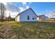 White house exterior with small patio and yard at 412 Lytton St, Troutman, NC 28166