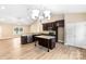 Kitchen with an island, dark wood cabinetry, and stainless steel appliances at 8695 Freeze Rd, Kannapolis, NC 28081
