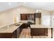Spacious kitchen featuring granite countertops, stainless steel appliances, and an island at 8695 Freeze Rd, Kannapolis, NC 28081