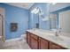 Double vanity bathroom with a tiled shower and tub at 8905 Rosalyn Glen Rd, Cornelius, NC 28031