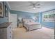 Serene bedroom with light blue walls and carpeted floor at 8905 Rosalyn Glen Rd, Cornelius, NC 28031