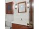 Bathroom with a vanity, toilet, and decorative wall cabinet at 14008 Creekside Dr, Matthews, NC 28105