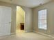 Bright bedroom with built-in desk and large window at 2001 Sentinel Dr, Indian Trail, NC 28079