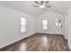 Spacious living room with hardwood floors and ceiling fan at 353 Lee St, Mooresville, NC 28115