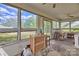 Sunroom with multiple windows, offering abundant natural light at 402 E Arch St, Lancaster, SC 29720