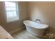 Elegant bathroom with freestanding tub and modern fixtures at 4033 Stadler Ne Dr # 22, Conover, NC 28613