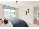 Bright bedroom with closet, window, and simple decor at 4692 Hopsack Dr # Cal0103, Indian Trail, NC 28079