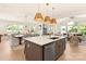 Kitchen with large island, pendant lights, and open concept layout at 4692 Hopsack Dr # Cal0103, Indian Trail, NC 28079