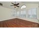 Sunroom with hardwood floors, vaulted ceiling, and abundant natural light at 4709 Polo Gate Blvd, Charlotte, NC 28216