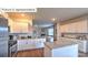 Well-appointed kitchen with white shaker cabinets, granite countertops and island at 533 Zermatt Ct, Monroe, NC 28112