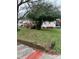 Charming house exterior with trees, front porch, and green lawn at 59 Mckinnon Ne Ave, Concord, NC 28025