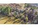 Bird's-eye view of lakefront property with a house and dock at 60 Sigmon Drum Rd, Hickory, NC 28601