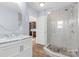 Bathroom with marble vanity and a glass shower at 60 Sigmon Drum Rd, Hickory, NC 28601
