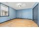 Spacious bedroom with hardwood floors and dark blue walls at 60 Sigmon Drum Rd, Hickory, NC 28601