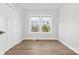 Spacious bedroom with hardwood floors and neutral walls at 60 Sigmon Drum Rd, Hickory, NC 28601