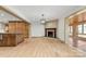 Bright dining room features hardwood floors, a brick fireplace, and built-in cabinetry at 60 Sigmon Drum Rd, Hickory, NC 28601
