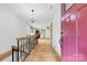 Grand entryway with hardwood floors and a beautiful chandelier at 60 Sigmon Drum Rd, Hickory, NC 28601