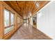 Sunroom features wood walls and ceiling, tile floors, and large windows at 60 Sigmon Drum Rd, Hickory, NC 28601