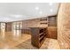 Home bar with wood cabinetry, shelving, and wine rack at 60 Sigmon Drum Rd, Hickory, NC 28601